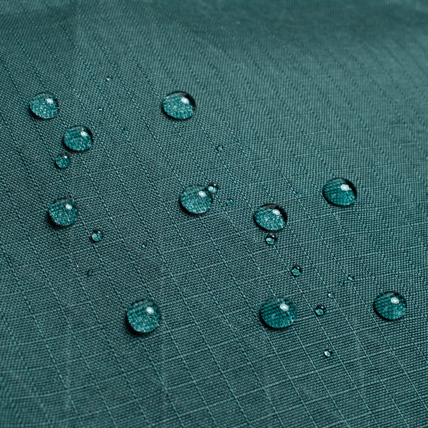 General shot of Topo Designs Global Pro Travel Tote showing water droplets on waterproof fabric